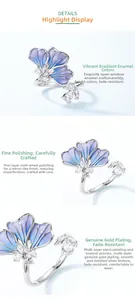 Macro detail of gradient blue enamel petals and gold plated ring band with zircon