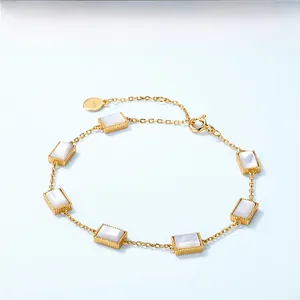 Detail of S925 sterling silver gold bracelet with rectangular white mother of pearl