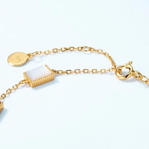 Elegant S925 sterling silver gold-plated bracelet featuring rectangular white shell stone