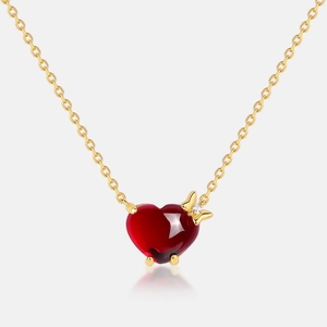 Close-up of S925 silver gold necklace with a red heart pendant and tiny diamond butterfly