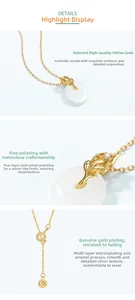 Détail du collier en argent s925 doré avec pendentif en jade Hetian et fermoir à ressort