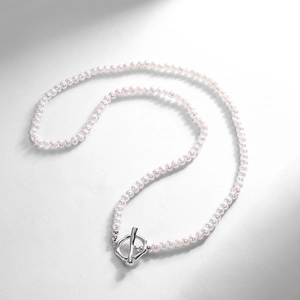 Elegant natural freshwater pearl necklace featuring a silver hexagonal OT toggle clasp closure