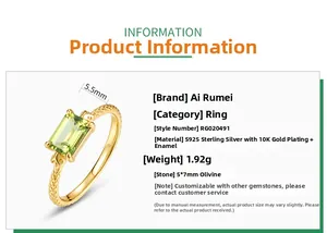 Detail of S925 silver ring with 5x7mm peridot and snake scale texture gold plating