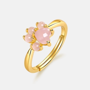 Detail view of S925 gold-plated cat paw ring with natural pink quartz stone accents