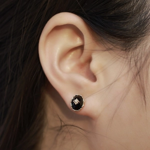 Vintage oval black onyx stud earrings in S925 sterling silver with starburst detail