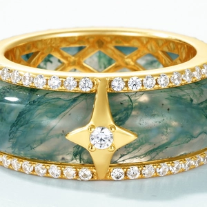 Golden S925 silver ring with moss agate, sparkling cubic zirconia pavé and star motif