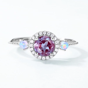 Macro shot of S925 silver ring featuring purple alexandrite stone and opal side accents