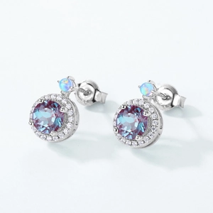 Detailed view of S925 silver stud earrings with Alexandrite, Zircon and Opal stones