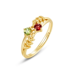 Bague en argent S925 doré avec pierres vertes et rouges et détails de feuilles