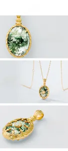 Detailed view of moss agate pendant with gold plating and intricate engraving
