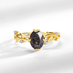 Vintage-Ring mit schwarzem Rutilquarz, Gold-Astdesign und funkelnden Diamanten