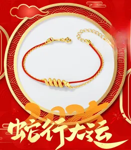 Detail of red braided bracelet with gold snake charm and adjustable S925 silver chain