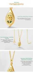 Macro detail of moss agate teardrop pendant with double-sided gold-plated star engraving