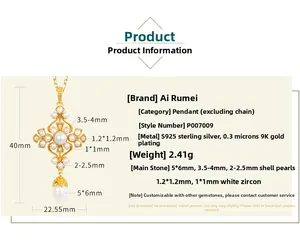 Détail du pendentif croix vintage en argent S925 avec or 9K et perles de nacre naturelle