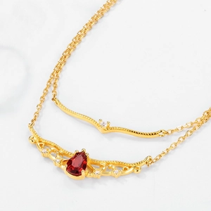 Elegant gold S925 sterling silver layered crown necklace with red pear garnet pendant