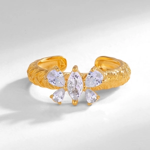 Elegant gold butterfly ring with zircon stones and textured Italian brushed finish
