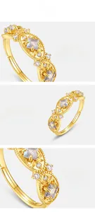 Detailed view of hollow out gothic ring with natural labradorite and 10K gold plating