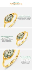 Macro detail of tear-drop green moss agate ring with polished gold plating finish