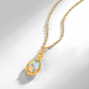 Vintage S925 silver necklace with drop-shaped opal perfume bottle pendant in gold