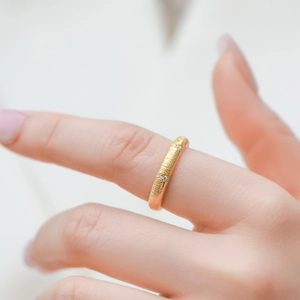 Minimalist gold plated S925 sterling silver brushed ring with small diamonds on finger