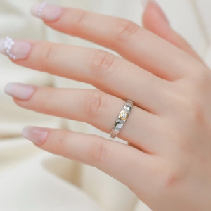 Elegant two-tone S925 sterling silver ring with white gemstone and gold plating detail