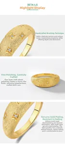 Macro detail of French vintage gold-plated S925 silver ring with brushed texture and stars
