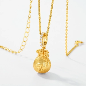Gold-plated sterling silver lucky bag necklace with matte finish and zircons