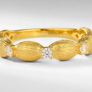 Handcrafted brushed 925 silver ring with 10K gold plating and three round zircons