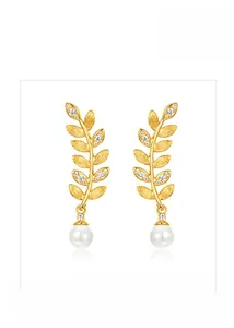 Detail of leaf-shaped silver earrings with gold plating, zircons and round pearls