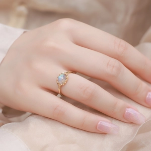 Elegant gold plated S925 silver ring featuring an oval labradorite with blue glow