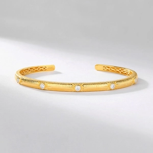 French luxury gold plated S925 sterling silver cuff with brushed texture and starburst stones