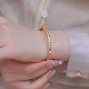 Elegant gold S925 silver brushed texture bracelet with sparkling round zircon stones