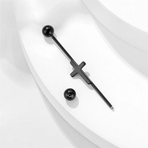 Macro shot of black stainless steel industrial barbell featuring a central cross design