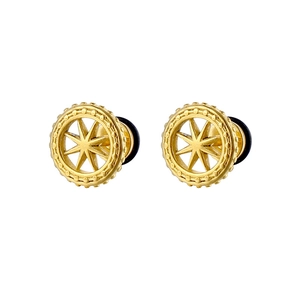 Detail of gold-plated stainless steel ear plugs with hollow star pattern and black silicone rings