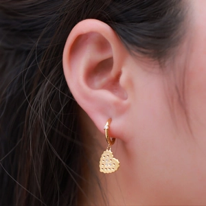 Luxe heart-shaped drop earrings with gold-plated textured finish and zircon accents