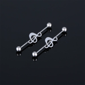 Detailed view of stainless steel industrial barbells with music treble clef design