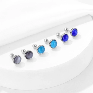 Three pairs of turquoise stainless steel stud earrings in blue and purple colors