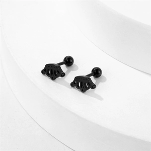 Retro black stainless steel crown barbell earrings set on white display stand