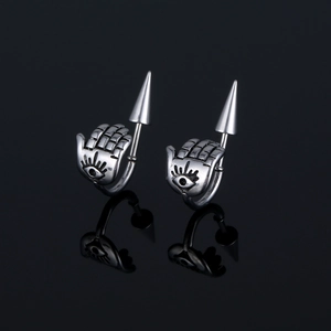 Gothic punk hand of fatima stainless steel huggie hoop earrings on black reflective background