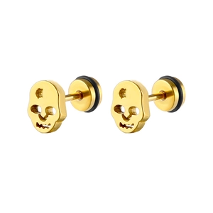 Macro detail of gold skull earrings with hollow eyes and secure screw backs for punk jewelry