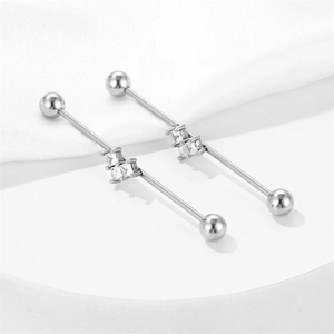 Silver stainless steel industrial barbell piercing with three square cubic zirconia stones