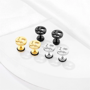 Three pairs of geometric titanium steel stud earrings in gold, black, and silver finishes