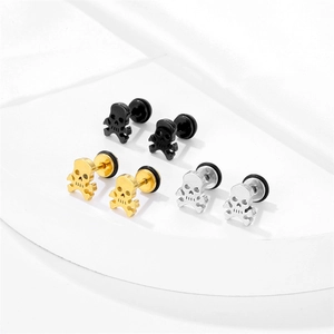 Three pairs of vintage skull stud earrings in black, gold, and silver stainless steel