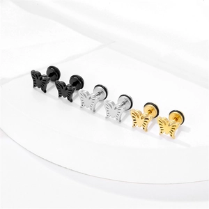 Three pairs of stainless steel butterfly stud earrings in black, silver and gold finish