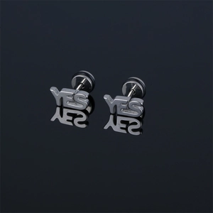 Polished stainless steel YES letter stud earrings with reflection on black mirror surface