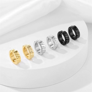 Three pairs of stainless steel hoop earrings with wave texture in gold, silver and black
