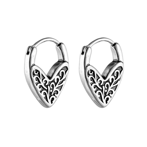 Vintage stainless steel heart-shaped ear cuffs with intricate hollow filigree design