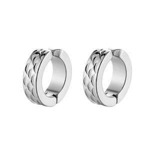 Detailed close-up of silver steel clip-on earrings with textured fish scale pattern