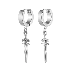 Detailed macro view of vintage stainless steel sword pendant earrings with ornate hilt design