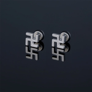 Minimalist silver stainless steel stud earrings featuring a polished Buddhist swastika symbol